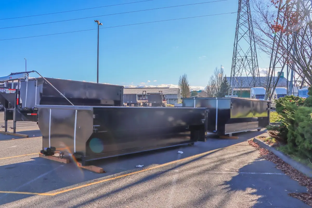 Roll-off dumpster ready for waste disposal at job site for Yard Waste Dumpster Rental in Vancleave